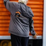 CRS Employee standing next to a orange storage garage door