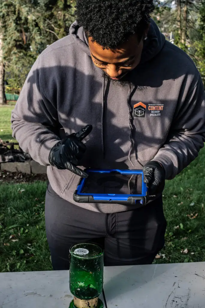 CRS Team member accessing damaged goods