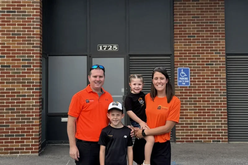 Amanda and Robb Reed standing outside the new CRS Location in St. Louis, MO